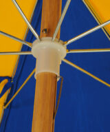 Closeup image of steel rib wood beach umbrella lower hub