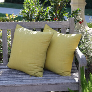 18 inch patio throw pillows sitting on outdoor bench
