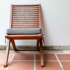 Patio chair with gray seat cushion