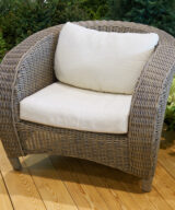 Deep seating wicker patio lounge chair with white seat and back cushion set