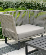 Patio lounge chair with gray seat cushion