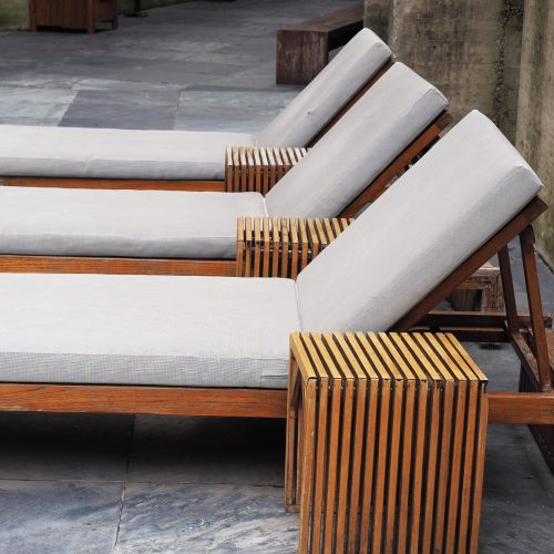 Patio chaise lounge with off-white cushion set